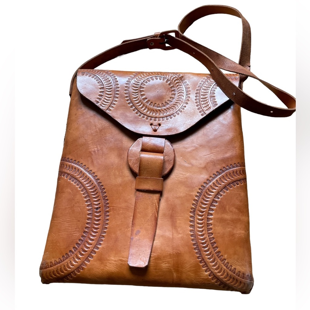 Incredible one of a kind hand tooled vintage leather bag.